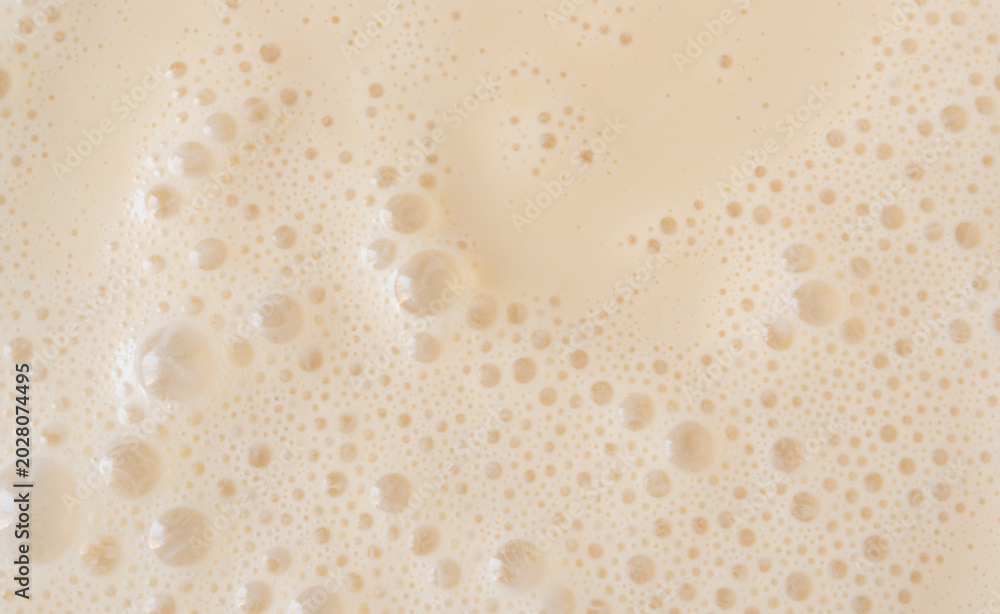 Fototapeta premium Coffee milkshake texture closeup