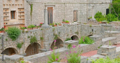 Historic Tvrdalj Castle Courtyard and Reflecting Pool in Stari Grad, Hvar Island, Croatia