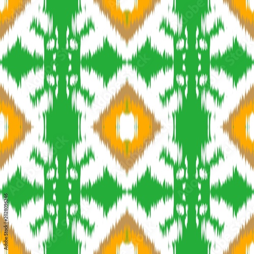 Seamless Green and Orange Ikat Pattern, Modern Ethic Geometric Fabric Background for Home Decor and Fashion Design
