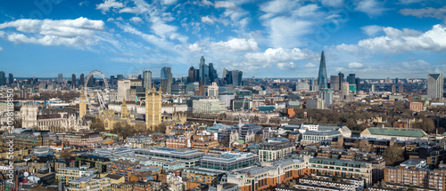 Panoramic aerial view of the skyline of London, England, with Westminster Abbey and Palace stretching back to the City<