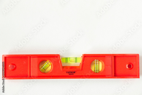 Professional spirit level tool for accurate surface leveling and alignment in construction, woodworking
