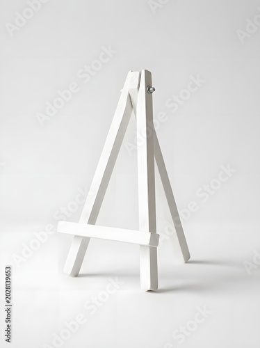 White wooden easel isolated on white background art and design concept