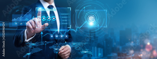 Market Strategist Using Digital Screen with Global Finance and networking international currency exchange data. Analyzing foreign market liquidity indices, mitigating global economic risk