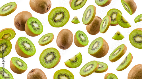 Fresh kiwi fruit flying and falling, whole and sliced pieces isolated on a transparent background.