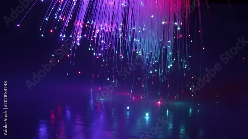 Vibrant glowing fiber optic strands creating an abstract digital network background