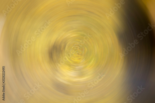 Gold swirl motion background with dynamic abstract circular movement
