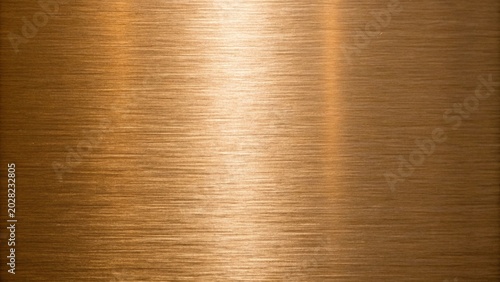 brushed bronze metal texture full frame background with linear grain