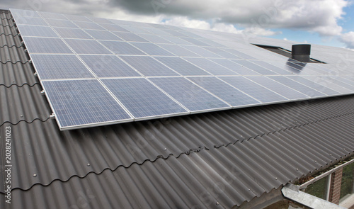 Solar panels at the roof of a stable of a farm