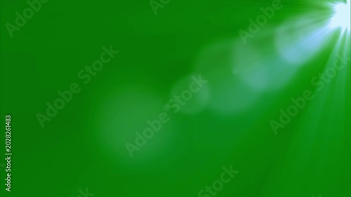Top right side sun rays on green screen. 4K beautiful white spotlight effects moving on top right. Flash lights, bright light lens flare effect