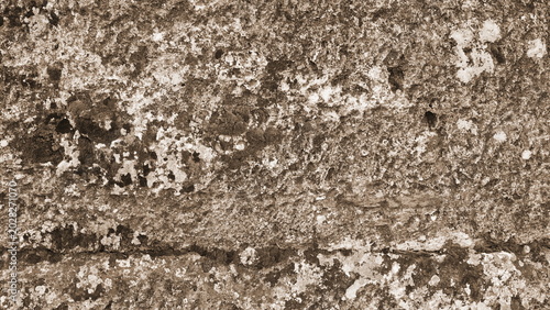 Foto Weathered Stone Wall Texture Background