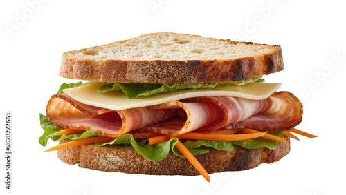 Canvastavla Hearty sandwich with rye bread ham cheese lettuce, and carrots