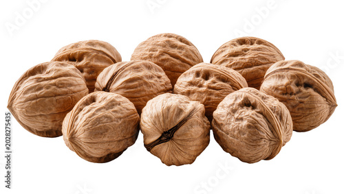Fotografi Group of whole walnuts with textured brown shells