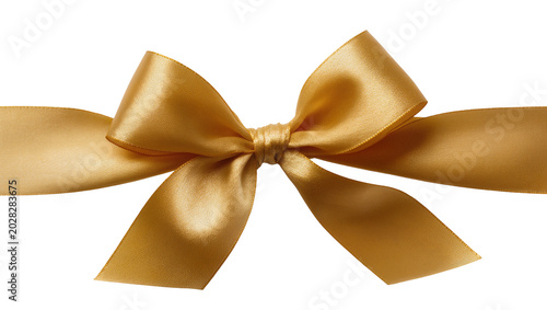 Foto Golden satin ribbon bow with flowing tails