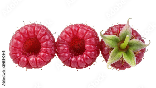 Foto Three ripe raspberries with green calyx on white