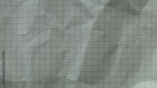 Tableau sur toile Softly wrinkled grid paper texture with subtle folds, suitable for natural desig