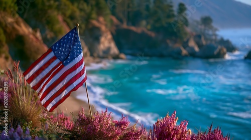 American flag on a rugged cliff overlooking the Big Sur coastline