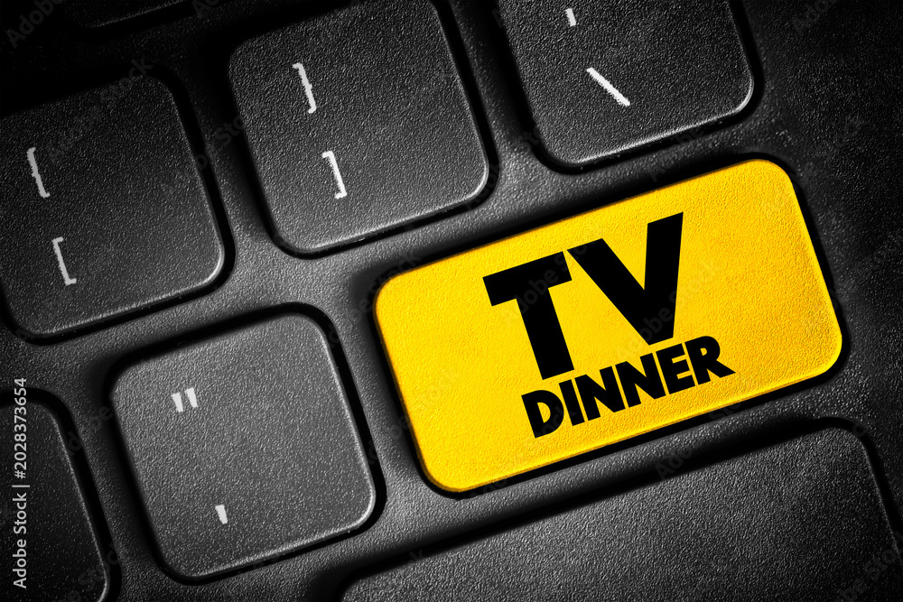 Fototapeta premium TV Dinner - is a packaged frozen meal that comes portioned for an individual, text button on keyboard, concept background