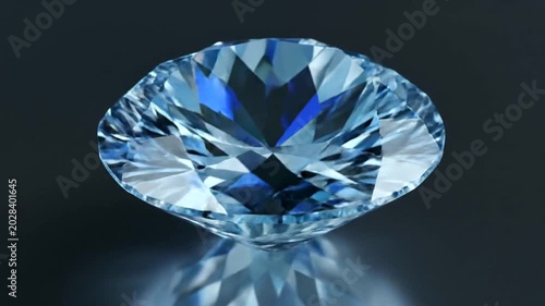 Close-up of a stunning blue diamond reflecting light on a dark surface.