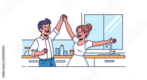 Joyful couple celebrating in a modern kitchen with blue accents