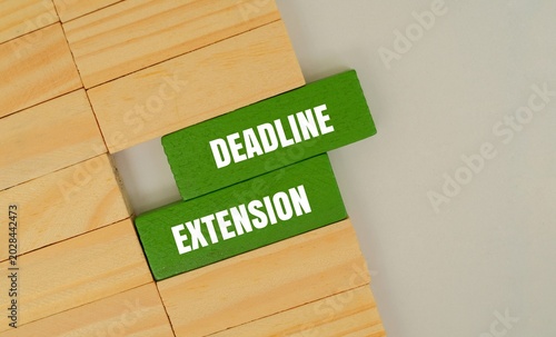 Slika na platnu Wooden blocks with the words DEADLINE  EXTENSION