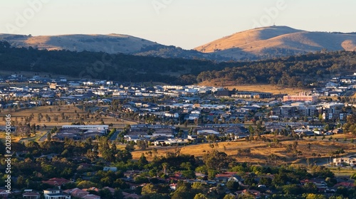 Фотография Aerial View of Canberra Residential Suburbs and Hilly Landscape at Sunset