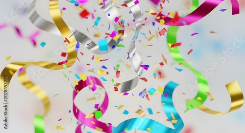 Festive celebration background featuring vibrant multi colored ribbons and falling confetti particles for holiday party events