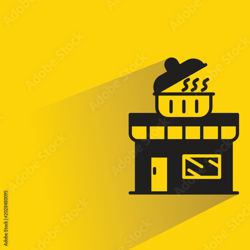 soup restaurant h shadow on yellow background