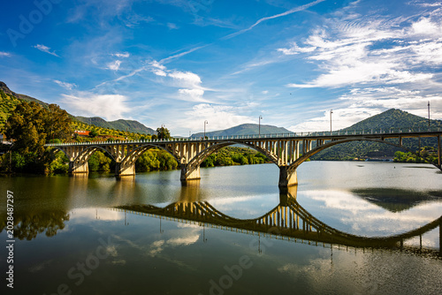 Modern Arch Bridge Reflected on the Douro River