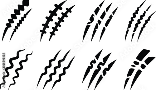 Bild auf Leinwand Set of black animal claw marks and sharp scratch texture silhouettes isolated on