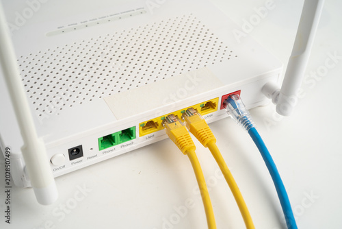 Ethernet cable with wireless router connect to internet service provider network.