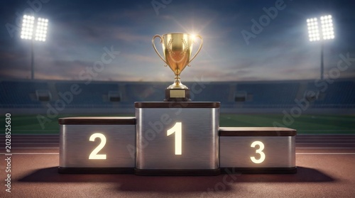 A golden trophy sits prominently on a podium, illuminated by stadium lights. The podium is numbered 2, 1, and 3, suggesting a competition.
