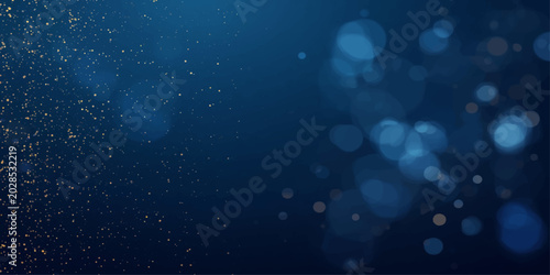 Photos Abstract blue bokeh winter holiday background with glowing lights snow and soft
