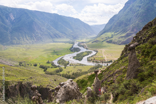 Stone pillars in the Valley of Chulyshman and scenic view of the Chulyshman River Valley, Altai Mountains, Russia