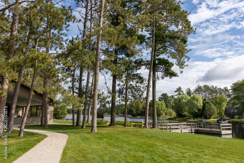 Pine River Park and Waterfront with Tall Pine Trees and Walking Path in Pine River, Minnesota