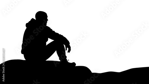 Cuadro en lienzo Silhouette of a man sitting on a rock, black silhouette, isolated on white backg
