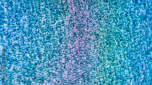 Tv static on a crt screen with a vertical pink stripe on blue teal noise