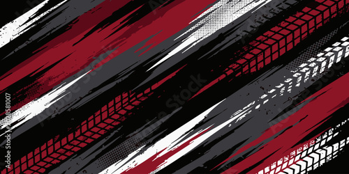 Vibrant abstract pattern of red, white, and black tire tracks on a dark surface
