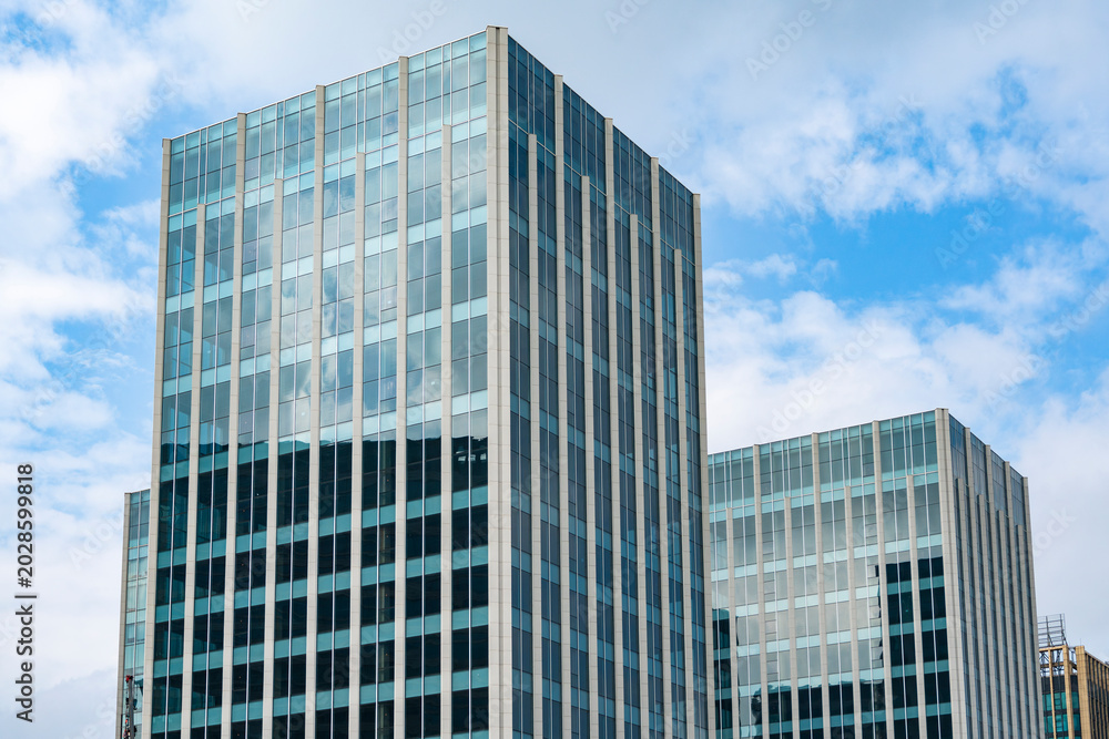 Obraz premium modern office building exterior in industrial area