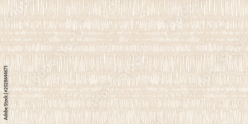 Fotografi A seamless, abstract textured background featuring distressed vertical lines in pale cream and soft ivory tones, resembling woven fabric