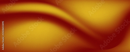 Golden fluid abstract satin backdrop with soft grain texture