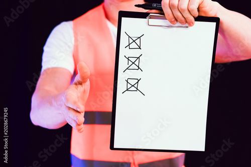 Cuadro en lienzo Worker showing thumbs up despite unchecked tasks