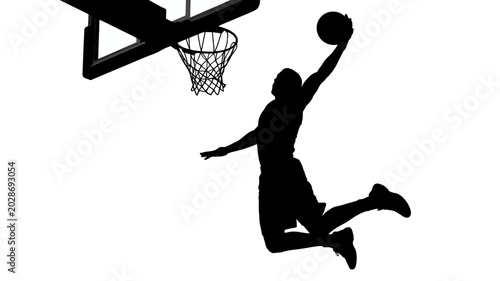 Cuadro en lienzo basketball player silhouette dunking towards the hoop against a white background