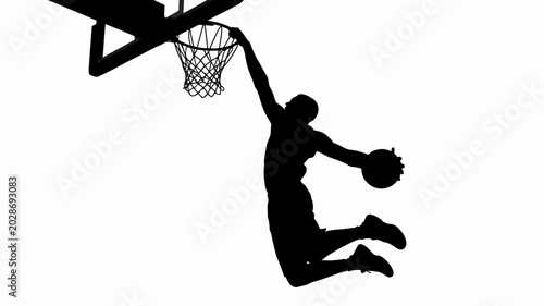 Schilderij op canvas basketball player silhouette dunking with ball against a white background