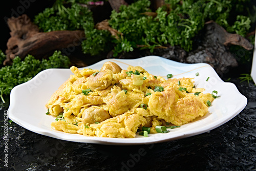Fotografija Traditional home-style stir-fried chives with free-range eggs