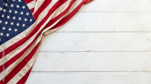 American flag draped elegantly over a rustic white wooden surface background