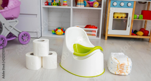 Obraz na plátně Toddler girl playing in room, potty training readiness concept