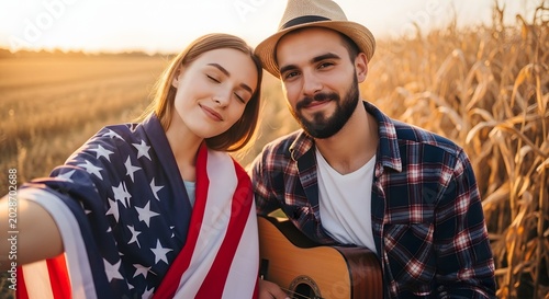 Happy couple embracing in golden wheat field at sunset with American flag