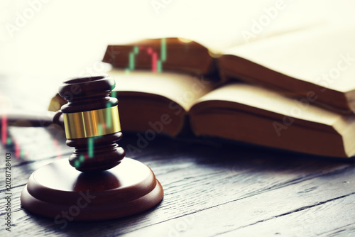 Tablou pe pânză Wooden judge gavel and legal book on wooden table