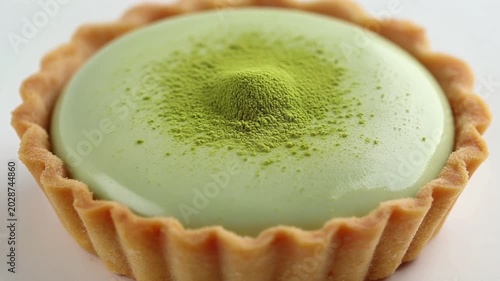 Creamy matcha pie with velvety green filling presents a sophisticated dessert aesthetic inspired by premium tea-flavored pastries.