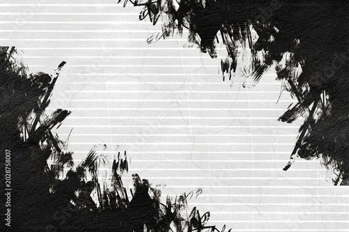 Abstract black ink brush strokes over white lined paper background texture